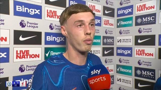 International athlete giving a post-match interview in English to journalists
